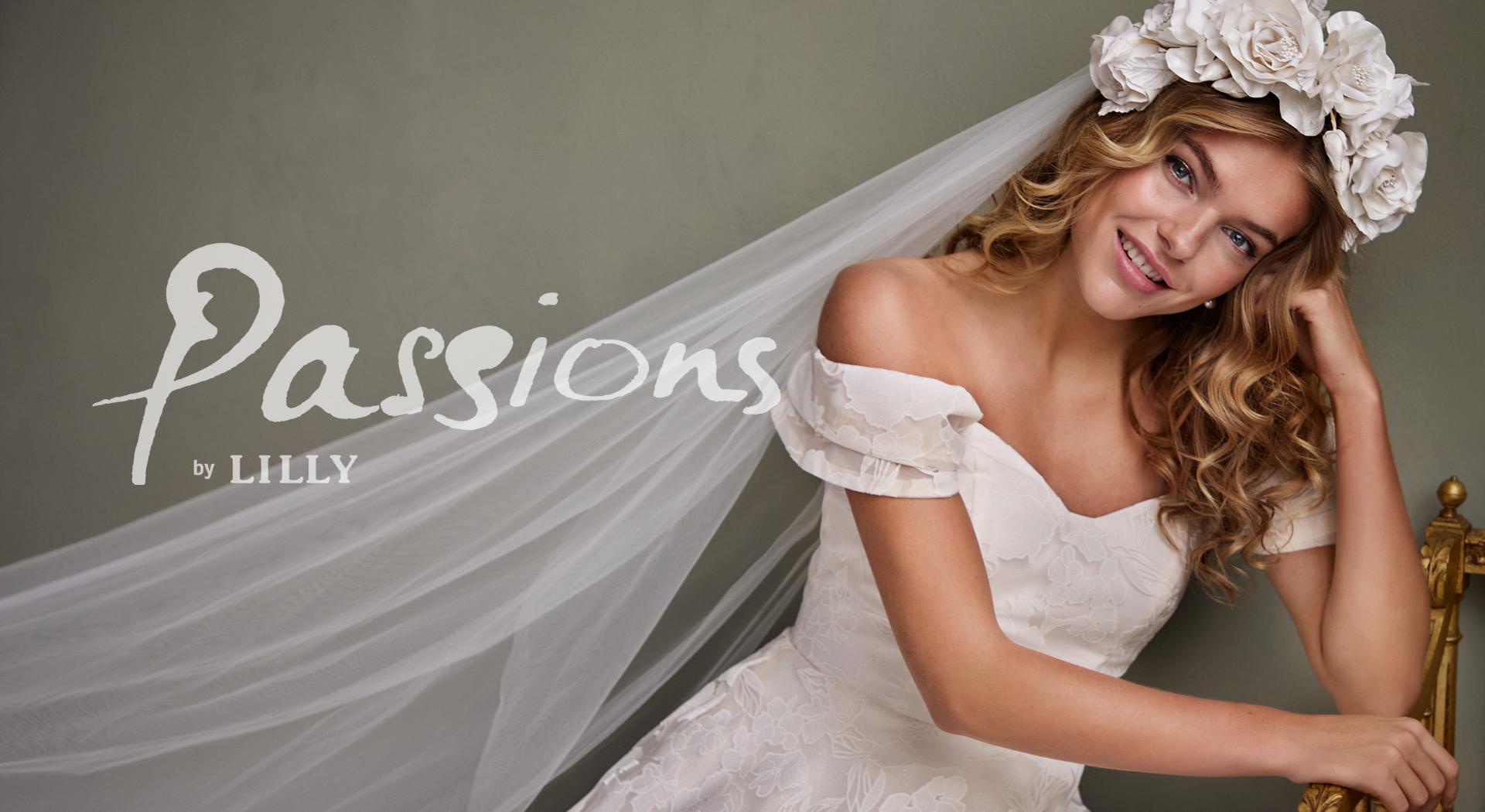 Off-shoulder Bridalgown in floral brocade from the bridal collection Passions by LILLY